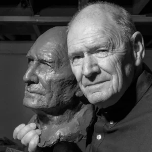 John Gollings Photographer with bronze bust by Maudie Brady