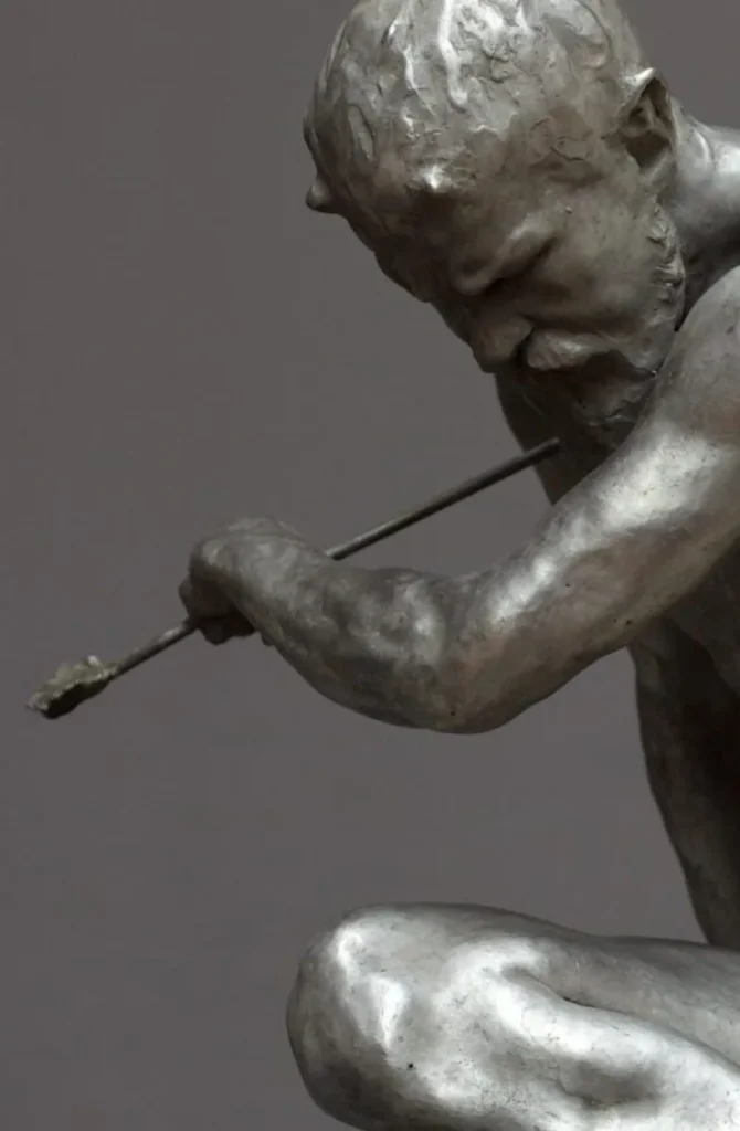 Wounded faun pulls arrow from shoulder