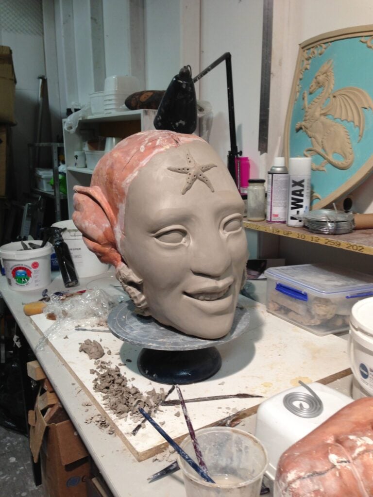 Clay sculpt of mermaid face for listening mermaid